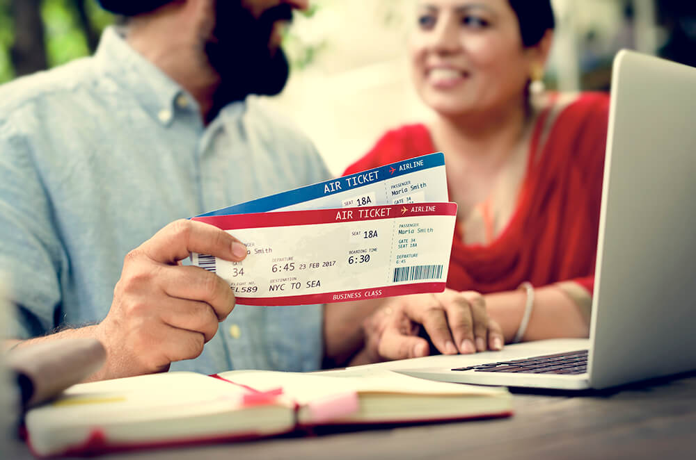 Couple planning a trip with GreyHill